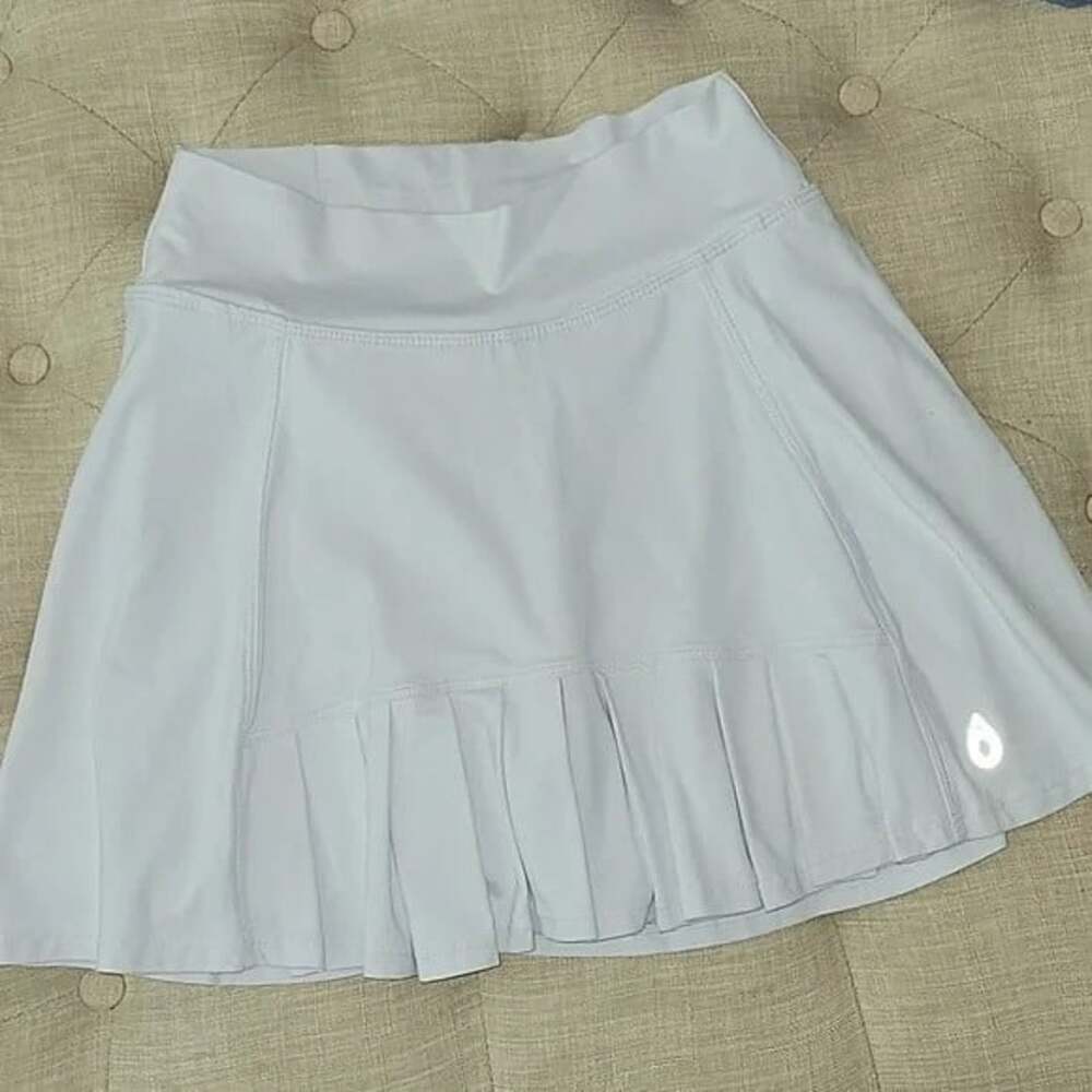 Dona Jo Donajo Flirty white tennis Skirt Sz 1, small pockets front pleats